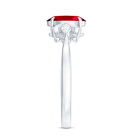 Oval lab-created ruby engagement ring with diamonds from Rosec Jewels, showcasing a 1.5 carat ruby and sparkling diamond accents.