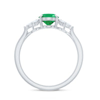 Natural 1.2 Carat Oval Emerald Engagement Ring with Diamond Trio