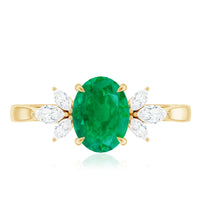 Natural 1.2 Carat Oval Emerald Engagement Ring with Diamond Trio