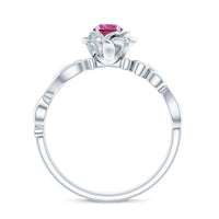 Pink tourmaline and diamond engagement ring from Rosec Jewels featuring a nature-inspired design and intricate metalwork.