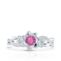 Rosec Jewels engagement ring featuring pink tourmaline and diamond accents, with a detailed view of the ring's design and gemstones.