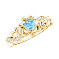 Natural aquamarine flower-inspired engagement ring with diamonds from Rosec Jewels, featuring a detailed floral design and sparkling gemstones.