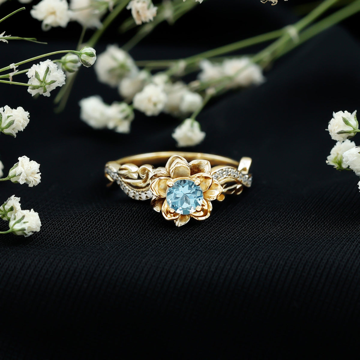 Rosec Jewels natural aquamarine flower-inspired engagement ring with diamond accents, showcasing intricate design and gemstone details.