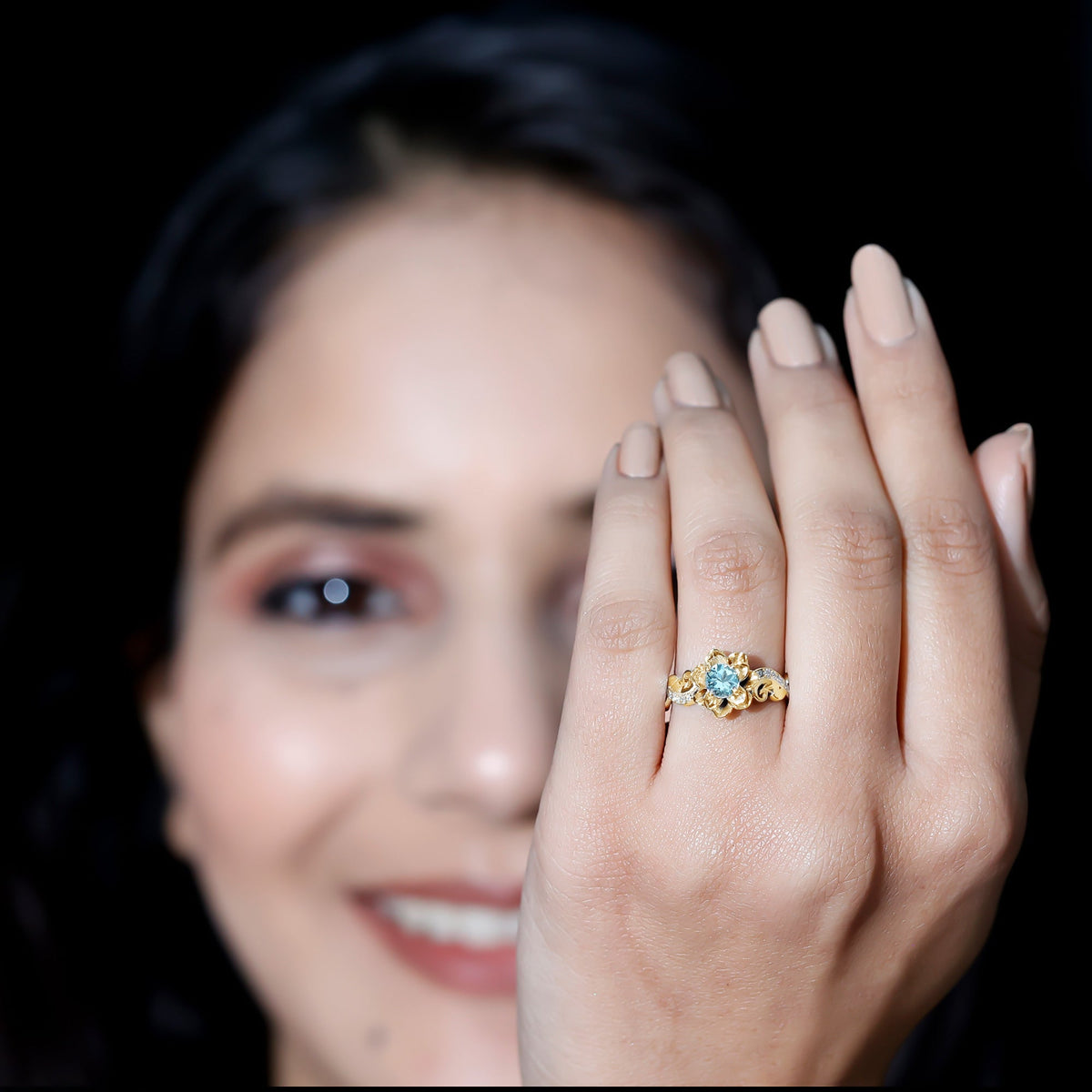 Natural aquamarine flower-inspired engagement ring with diamonds from Rosec Jewels, featuring a detailed floral design and sparkling accents.