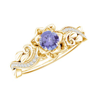 Nature-inspired Tanzanite engagement ring with diamond accents, crafted by Rosec Jewels, showcasing intricate design and sparkling gemstones.