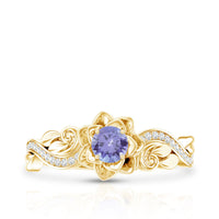 Rosec Jewels tanzanite engagement ring with diamond, featuring a nature-inspired design and elegant gemstone setting.