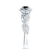 Black spinel blooming flower engagement ring with diamond accents by Rosec Jewels, showcasing intricate floral design and sparkling gemstones.