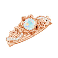 Genuine Ethiopian Opal flower engagement ring with real diamond setting, featuring intricate design and sparkling gemstones.