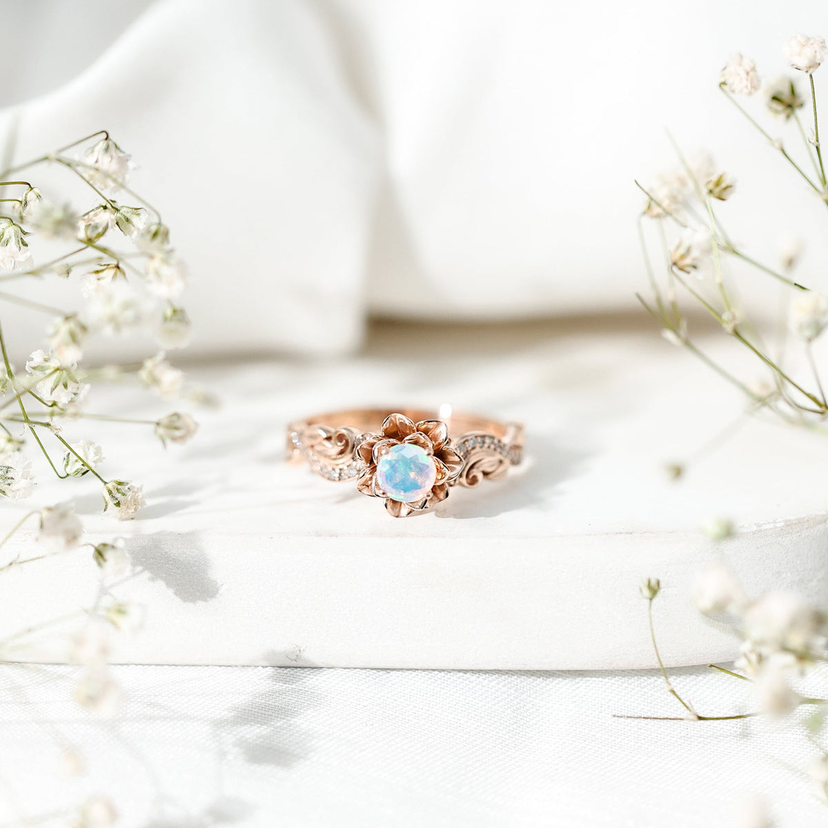 Genuine Ethiopian opal flower engagement ring with real diamond by Rosec Jewels, featuring a vibrant opal centerpiece and delicate band.