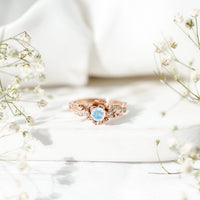 Genuine Ethiopian opal flower engagement ring with real diamond by Rosec Jewels, featuring a vibrant opal centerpiece and delicate band.