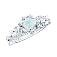 Genuine Ethiopian opal flower engagement ring with real diamond from Rosec Jewels, showcasing a vibrant opal and sparkling diamond accents.