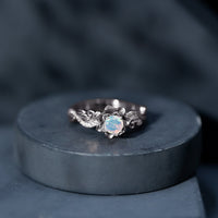 Genuine Ethiopian Opal flower engagement ring with real diamond set in a silver band by Rosec Jewels.