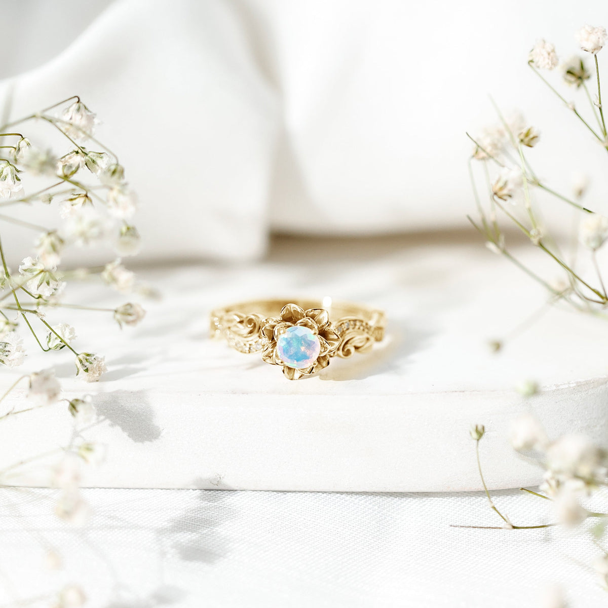 Genuine Ethiopian Opal flower engagement ring by Rosec Jewels with a sparkling real diamond accent, showcasing intricate floral design.