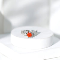 Nature-inspired fire opal and diamond engagement ring by Rosec Jewels featuring intricate design and sparkling gemstones.