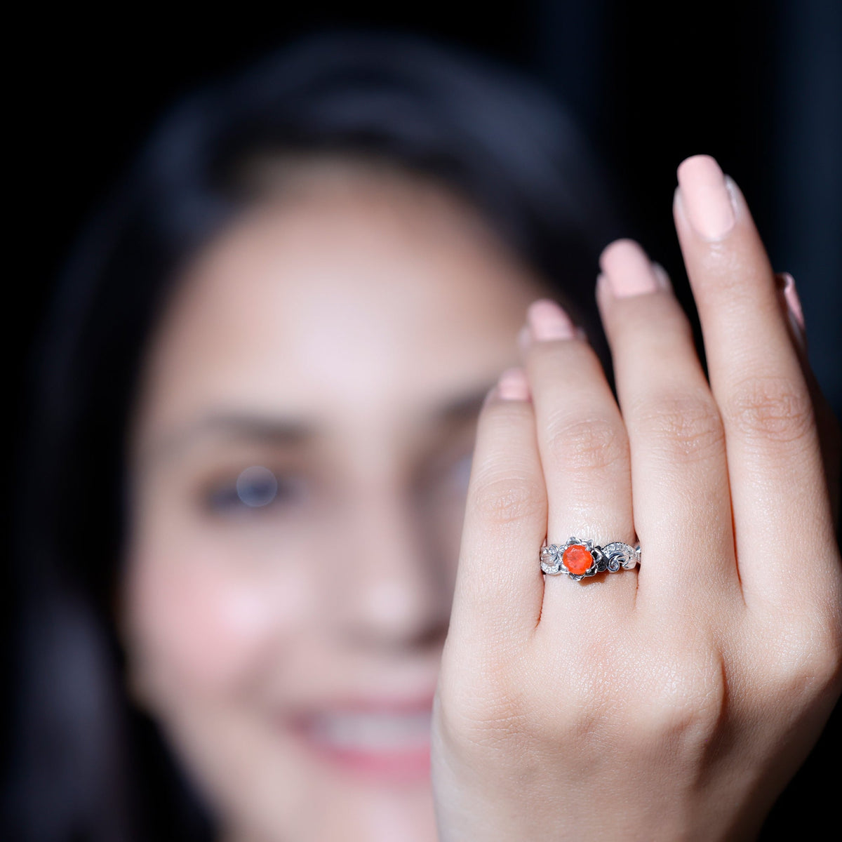 Nature-inspired fire opal and diamond engagement ring by Rosec Jewels, featuring a detailed design and sparkling gemstones.