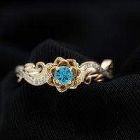 Rosec Jewels 0.6 Carat London Blue Topaz engagement ring with round shape blue topaz and diamond accents, nature-inspired design.