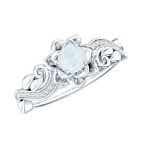 Natural moonstone rose flower engagement ring with diamond accents from Rosec Jewels, showcasing intricate floral design and shimmering gemstones.