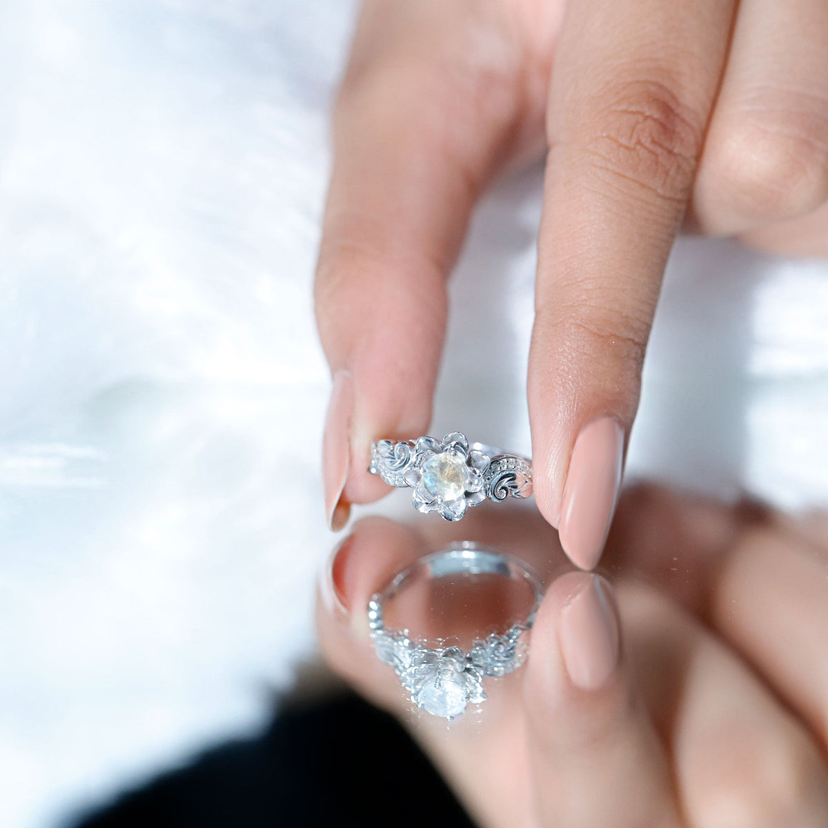 Rosec Jewels natural moonstone rose flower engagement ring with diamond, featuring a detailed floral design and sparkling gemstone.