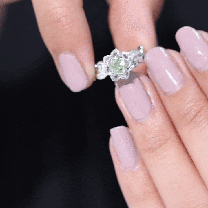Genuine peridot and diamond flower-inspired engagement ring by Rosec Jewels featuring yellow gold band and intricate floral design