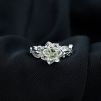 Genuine peridot and diamond flower-inspired engagement ring by Rosec Jewels, featuring intricate gemstone detailing and elegant design.