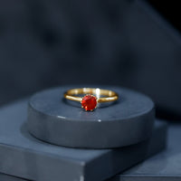 0.75 Carat Round Fire Opal Solitaire Ring in Lotus Basket Setting