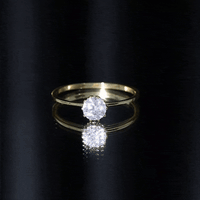 0.9 Carat Moissanite Solitaire Ring in Lotus Basket Setting