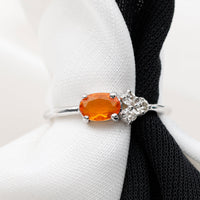Oval Cut Fire Opal Promise Ring with Diamond Trio