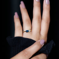 0.4 Carat Oval Cut London Blue Topaz East West Promise Ring with Diamond Trio
