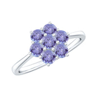 Natural Tanzanite flower cluster engagement ring featuring a vibrant blue-purple tanzanite gemstone set in an elegant ring design.