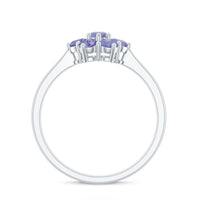 Natural Tanzanite flower cluster engagement ring by Rosec Jewels featuring a vibrant tanzanite gemstone and intricate floral design.
