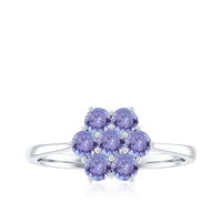 Natural Tanzanite flower cluster engagement ring featuring a vibrant blue tanzanite gemstone set in a delicate ring design.