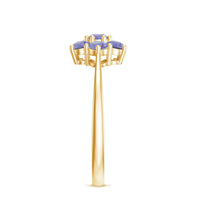 Natural Tanzanite flower cluster engagement ring featuring a vibrant blue Tanzanite gemstone set in a delicate ring band.