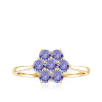 Natural Tanzanite flower cluster engagement ring by Rosec Jewels featuring a vibrant blue tanzanite gemstone in a floral design.