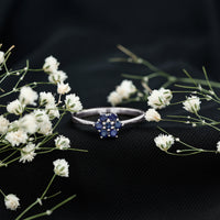 Certified round shape blue sapphire cluster flower ring by Rosec Jewels, featuring a floral design with sparkling blue sapphires.