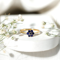 Certified round shape blue sapphire cluster flower ring by Rosec Jewels, featuring a floral design with vibrant blue sapphires.