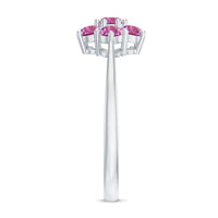 Round pink tourmaline flower engagement ring by Rosec Jewels featuring a delicate floral design in sterling silver.