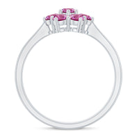 Round pink tourmaline flower engagement ring by Rosec Jewels featuring a delicate floral design and sparkling gemstone.