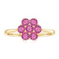 Round pink tourmaline flower engagement ring by Rosec Jewels, featuring a delicate floral design and a shining pink gemstone centerpiece.