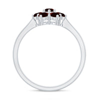 Natural garnet flower cluster engagement ring by Rosec Jewels featuring a vibrant red garnet flower design in sterling silver.
