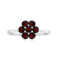 Natural garnet flower cluster engagement ring featuring intricate gemstone flower design and sterling silver band.