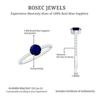 0.95 Carat Round Blue Sapphire Solitaire Ring with Diamond Side Stones