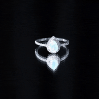 0.7 Carat Natural Ethiopian Opal Teardrop Engagement Ring with Diamond Halo