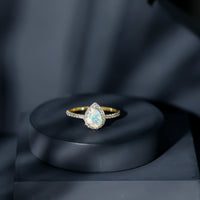 0.7 Carat Natural Ethiopian Opal Teardrop Engagement Ring with Diamond Halo