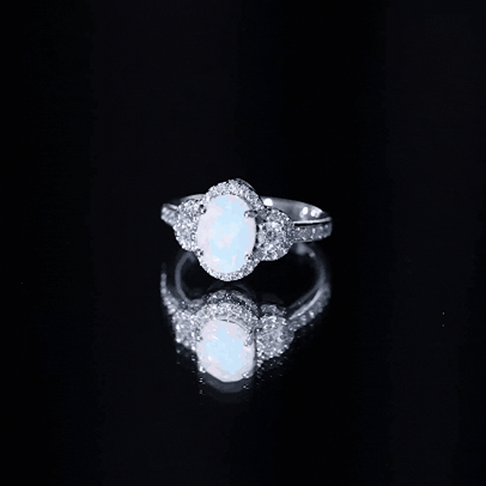 Vintage-inspired opalescent oval engagement ring with real diamond from Rosec Jewels, showcasing a yellow band and intricate design.
