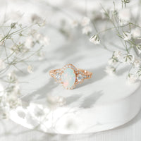 Vintage-inspired opalescent oval engagement ring with real diamond from Rosec Jewels, featuring a detailed metal band and elegant design.