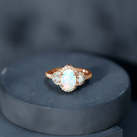 Vintage inspired opalescent oval engagement ring with real diamond from Rosec Jewels featuring a detailed ring design.