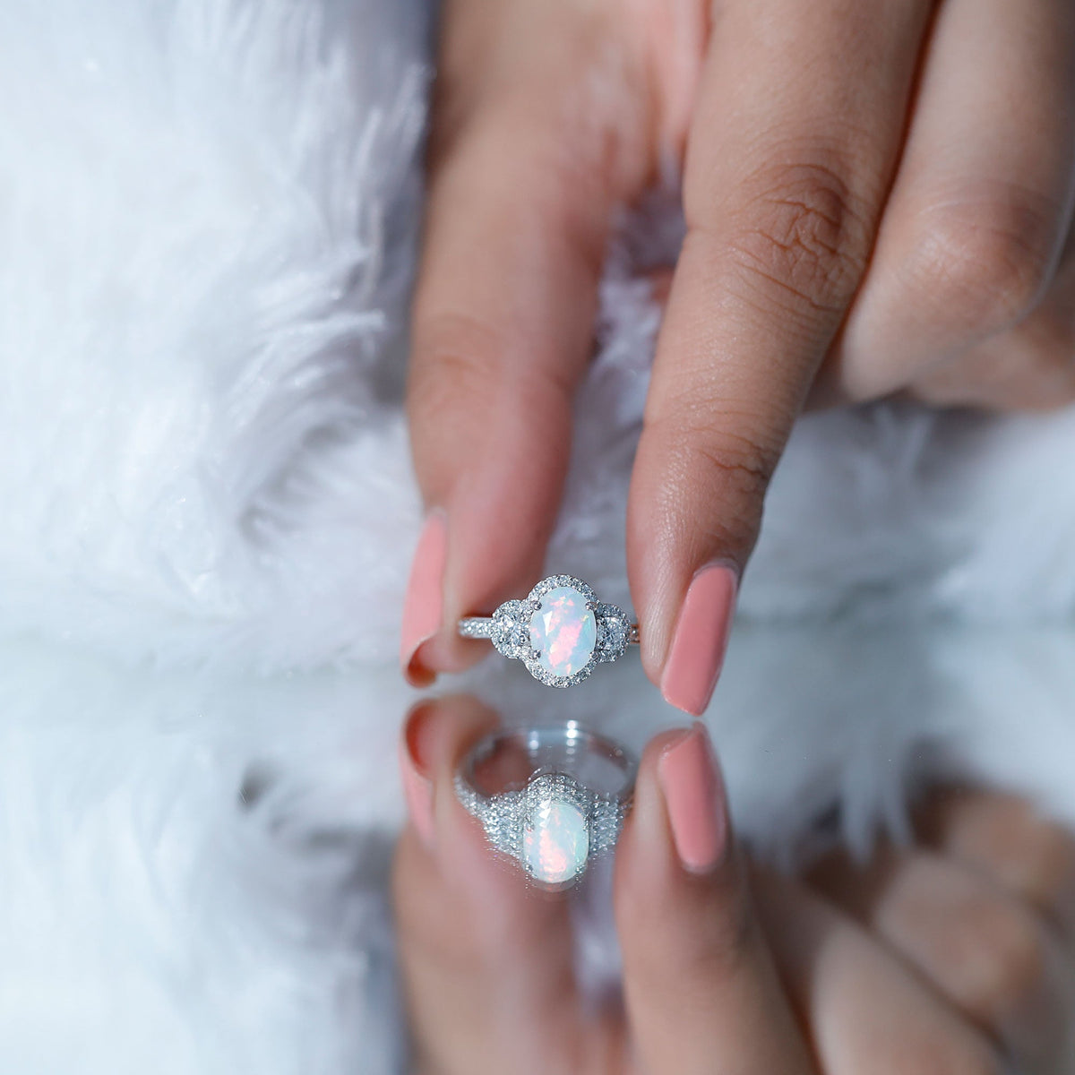 Vintage-inspired opalescent oval engagement ring with real diamond from Rosec Jewels, featuring a detailed metal band and elegant design.