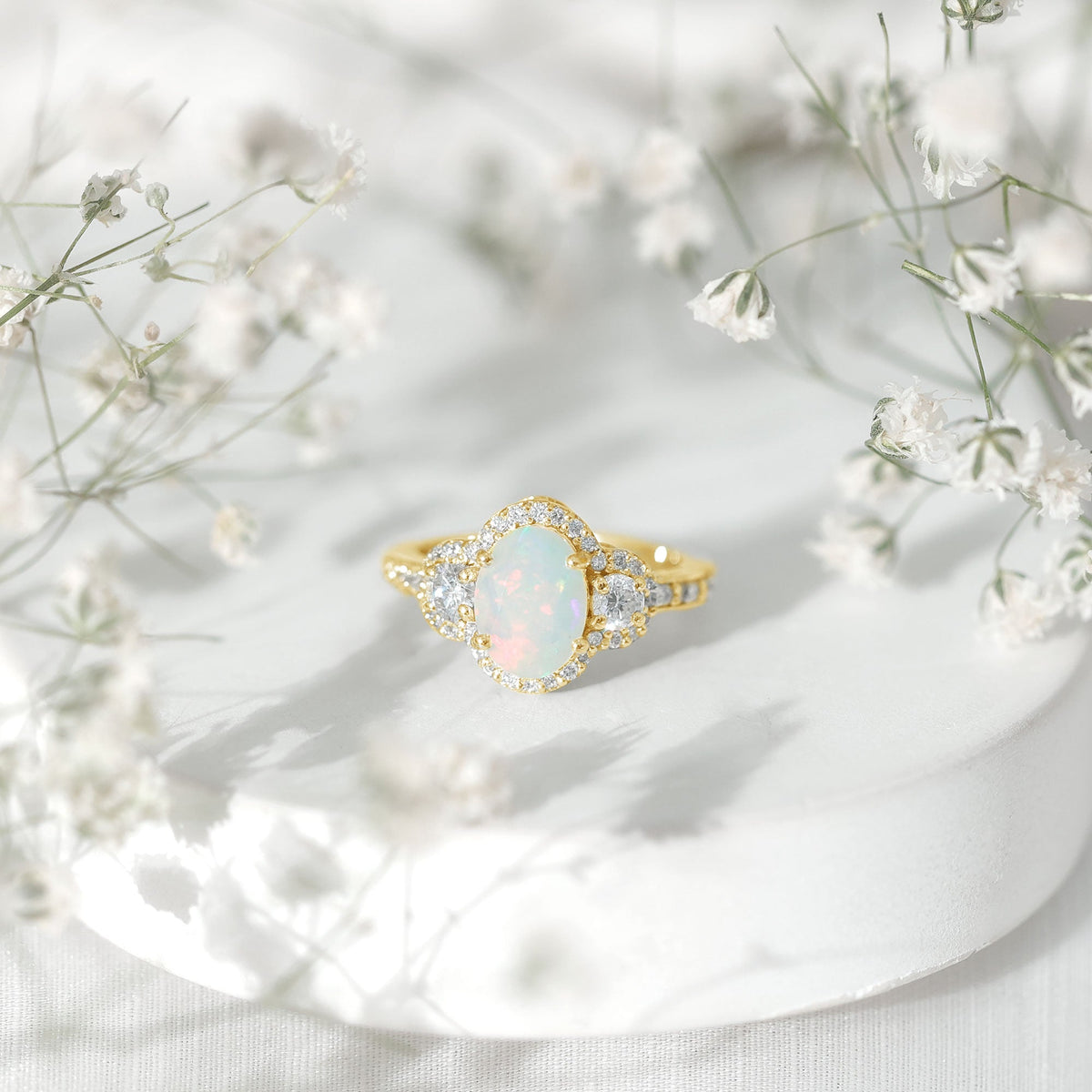 Vintage-inspired opalescent oval engagement ring with real diamond by Rosec Jewels, featuring a detailed, elegant design.