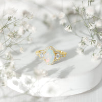 Vintage-inspired opalescent oval engagement ring with real diamond by Rosec Jewels, featuring a detailed, elegant design.