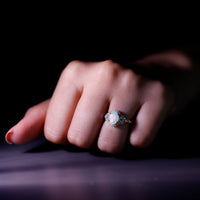 Vintage-inspired opalescent oval engagement ring with real diamond from Rosec Jewels, showcasing intricate design and sparkling center stone.
